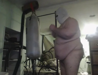 FatAssSmallDick punches punching bag