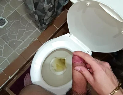 Two Shots of Cum on the Pee in the Bathroom