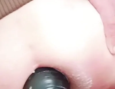 Young Woman in Her Blue Panties Enjoying a Pleasurable Experience with a Mega Dilator