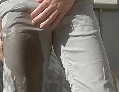Jules Wets His Grey Pants and Exposes His Semi-hard Cock Through His Trousers
