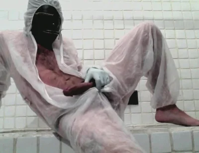 Masked Femboy in Suit Pees Itself and Cums