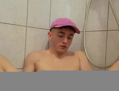 Young Twink Plays with His Piss and Jerks off