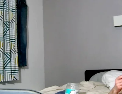 On Bed Laying Down with Socks and Beater on