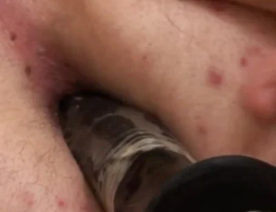 Threesome gay action with dildo involved