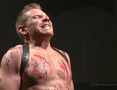 Alex Adams Endures the Cock, Balls and Ass Torment