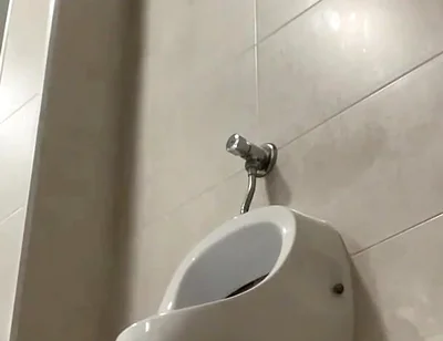 Amateur Twink Boy and Older Guy Caught Having Risky Fun in the Pool's Public Toilets