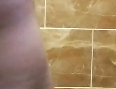 Some Scenes of Cutting Hair in the Toilet with the Door Closed