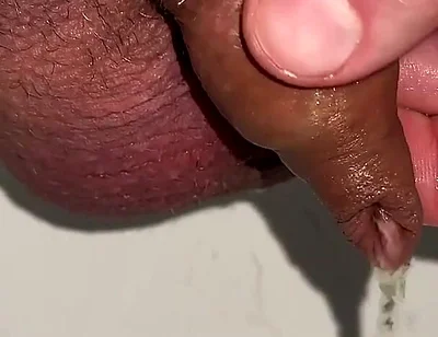 Playing with Foreskin While Peeing