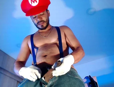 Dressed as Mario Bros Playing with His Plumbing Tool