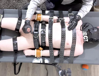 Rubber Twink Strapped Down and Made to Eat His Own Cum