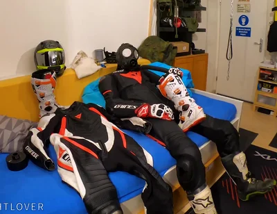 Wanking in biker suit cum