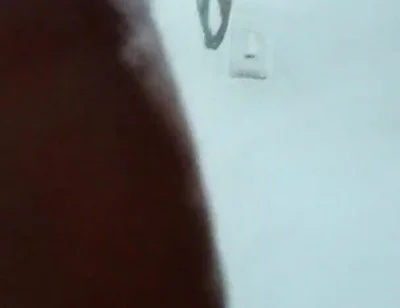 Spilling milk while my neighbor stares out the window