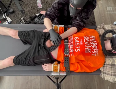 Gas Mask Boy Strapped Down and Edged