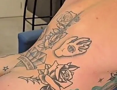 Big Tattooed Guy with a Tight Ass