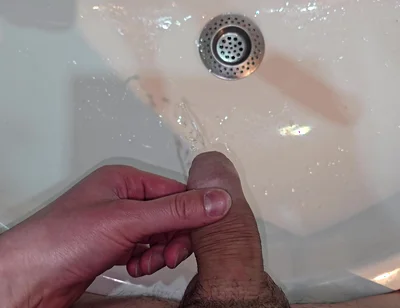 Pissing to the Bathroom Sink