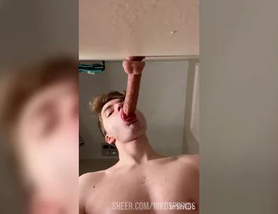 Cock Hungry Twink Slobbers on Giant Dildo!