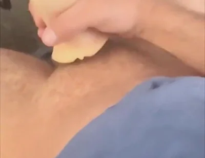 Playing with Toy Under Office Desk