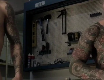 Two Friends in the Mechanic's Workshop