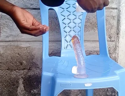 Big Black Ass Bottom Riding His Dildo Outside