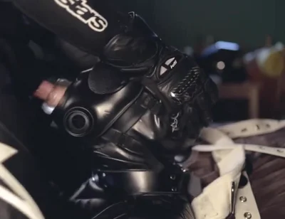 Rubber boy sucking biker master cock