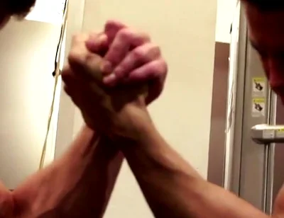Amateur Fitness Guys Arm Wrestle in the Gym