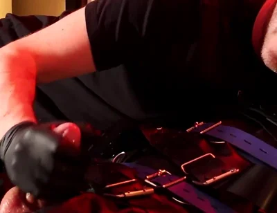 Edging the Boy in Leather Bondage but He Is Not Allowed to Orgasm