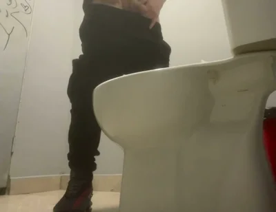 Amateur Friends Pissing Together in the Club's Toilets