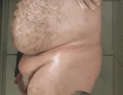Fat Bear Taking a Shower