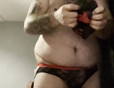 Anal Crossdressers Cuffed Cock and Ball with Pierced Nipples