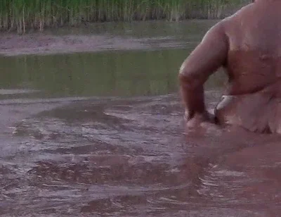 Mud Bath in Deep Quarry Mud Pond