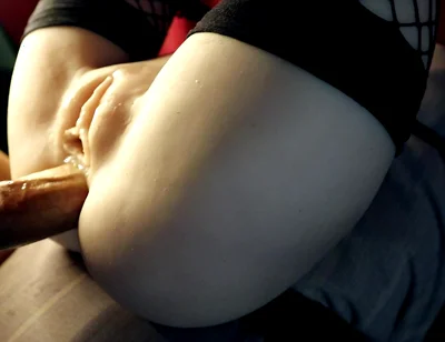 A Beauty in Stockings Spreads Her Charms in Front of a Big Cock