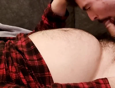 Sucking off a Hairy Bear on the Sofa