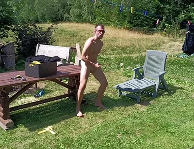 Jerking off While Hanging Out the Laundry