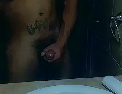 Masturbating