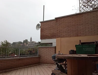 On the Terrace, in the Rain