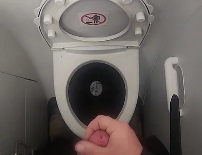 Airplane Bathroom Jerk and Cum.