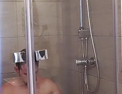 After a Full Day on the Road Wet Solo in the Hotel Shower