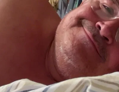 Man Lying in Bed