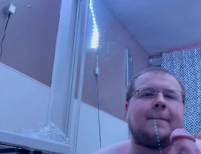 Chubby Bi Dude Gives Oral To Big Black Dildo