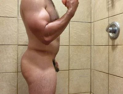 Muscle Cub with Dildo in Gym Showers