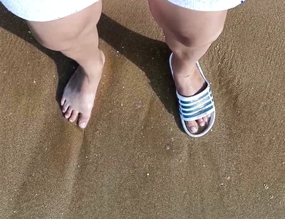 Feet and the Sea Extra Slowmotion - One Foot Barefoot and Foot in Slide - Great Feet in Sea