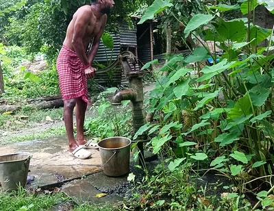 Tha naked Indian mature man shower in open place and showing body and dick..