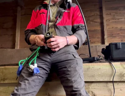 Farmer Smokes and Milks Himself with the Milking Machine