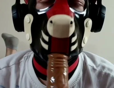 Latex Pet Sucks His Rubber Bone. Watch the Full on My Fancentro