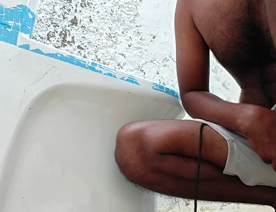 Washing the Bathroom in Xhard Village