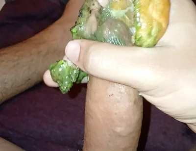 Enjoying a Donut with Haloween Decoration.