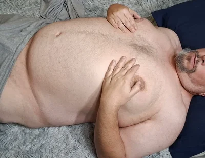 Chubby Guy Lays on Floor and Cums