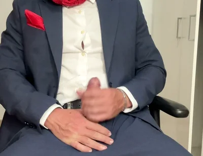 I Masturbate While Wearing a Suit and a Red Tie.