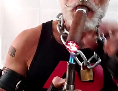 Leather Dad Lighting a Big Ring
