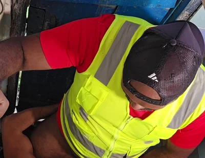 Construction Site Bathroom and Workers